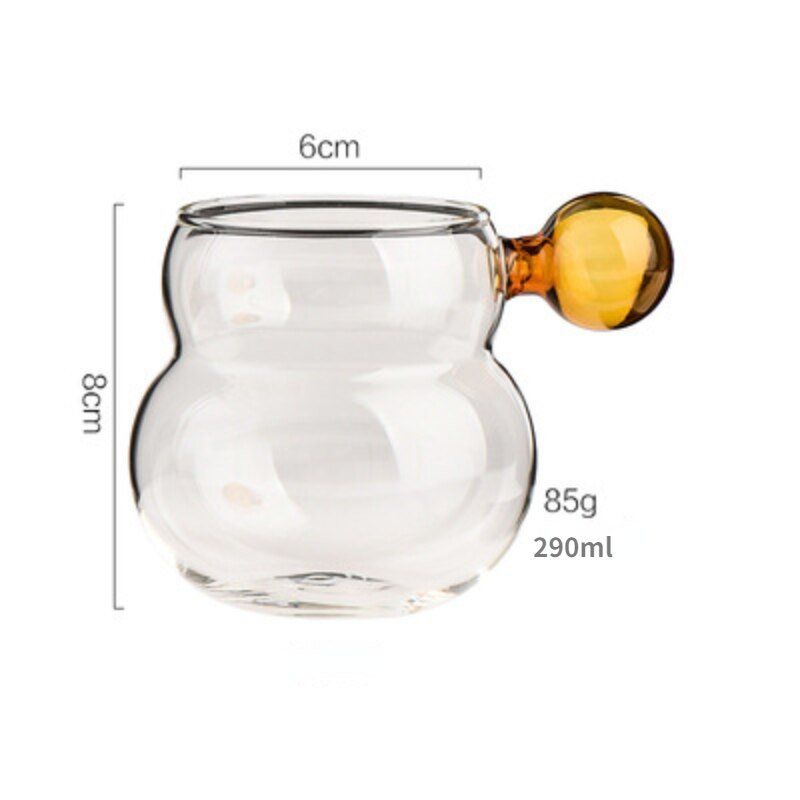 Cartoon Heat Resistant Glass Ball Handle Mug - The House Of BLOC